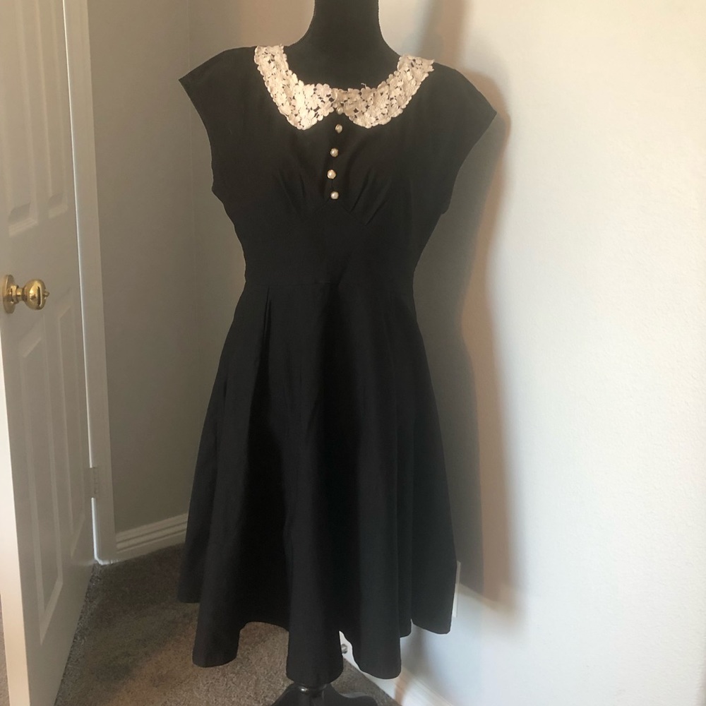 Black dress with white lace collar